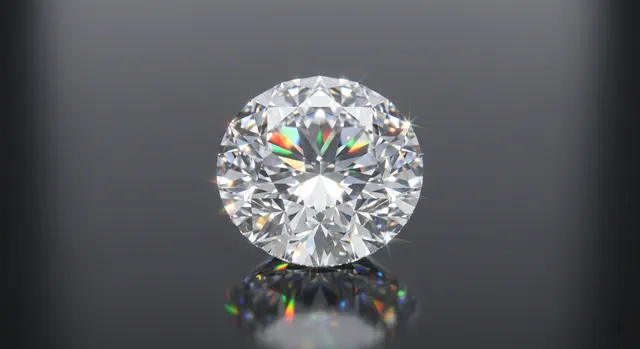 Loose diamond photographed on a dark background showing fire and sparkle